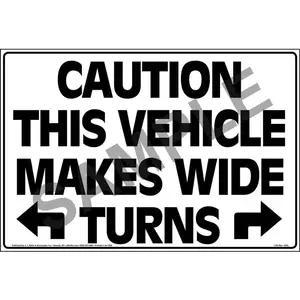 Caution This Vehicle Makes Wide Turns Sign with Arrows