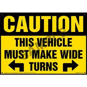 Caution: This Vehicle Must Make Wide Turns Sign