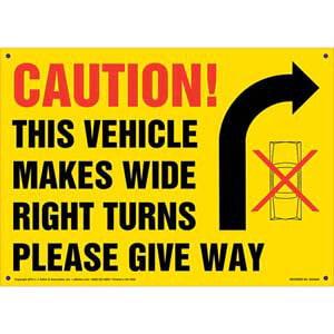 Caution: Vehicle Makes Wide Right Turns Sign