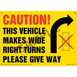 Caution: Vehicle Makes Wide Right Turns Sign