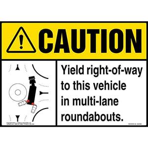 Caution: Yield Right-Of-Way To This Vehicle In Multi-Lane Roundabouts Sign with Icon - ANSI
